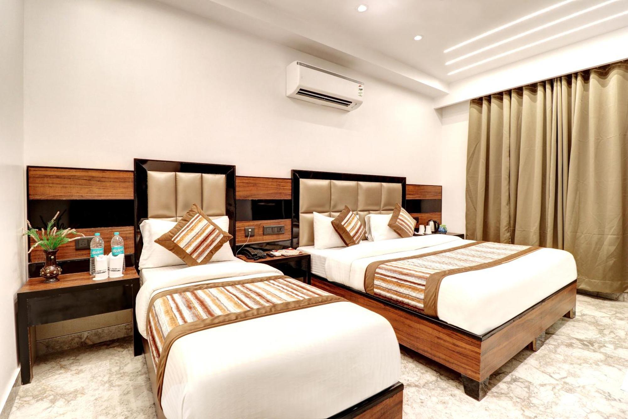 hotel emporio deluxe Nueva Delhi Habitación foto