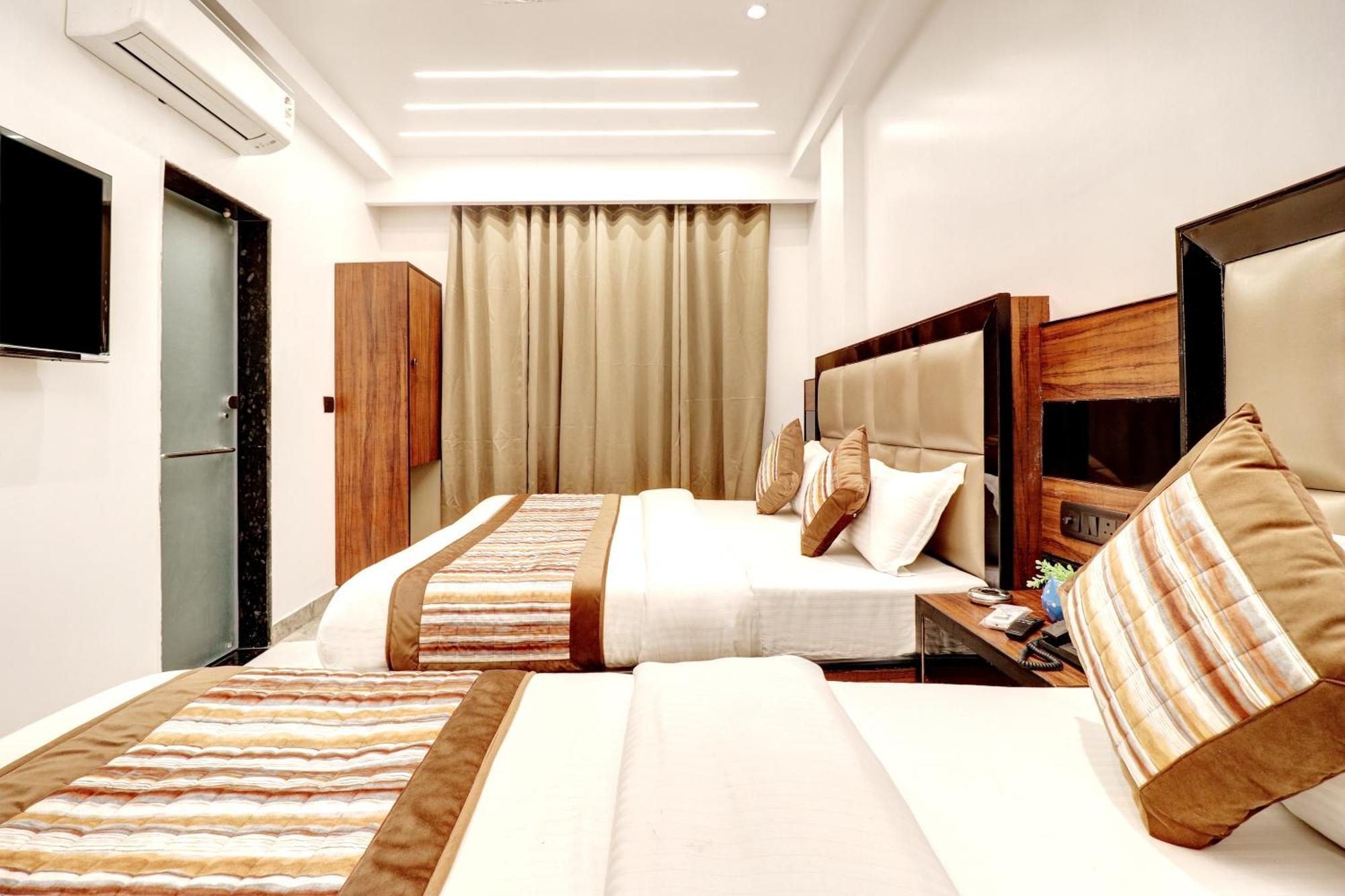 hotel emporio deluxe Nueva Delhi Habitación foto